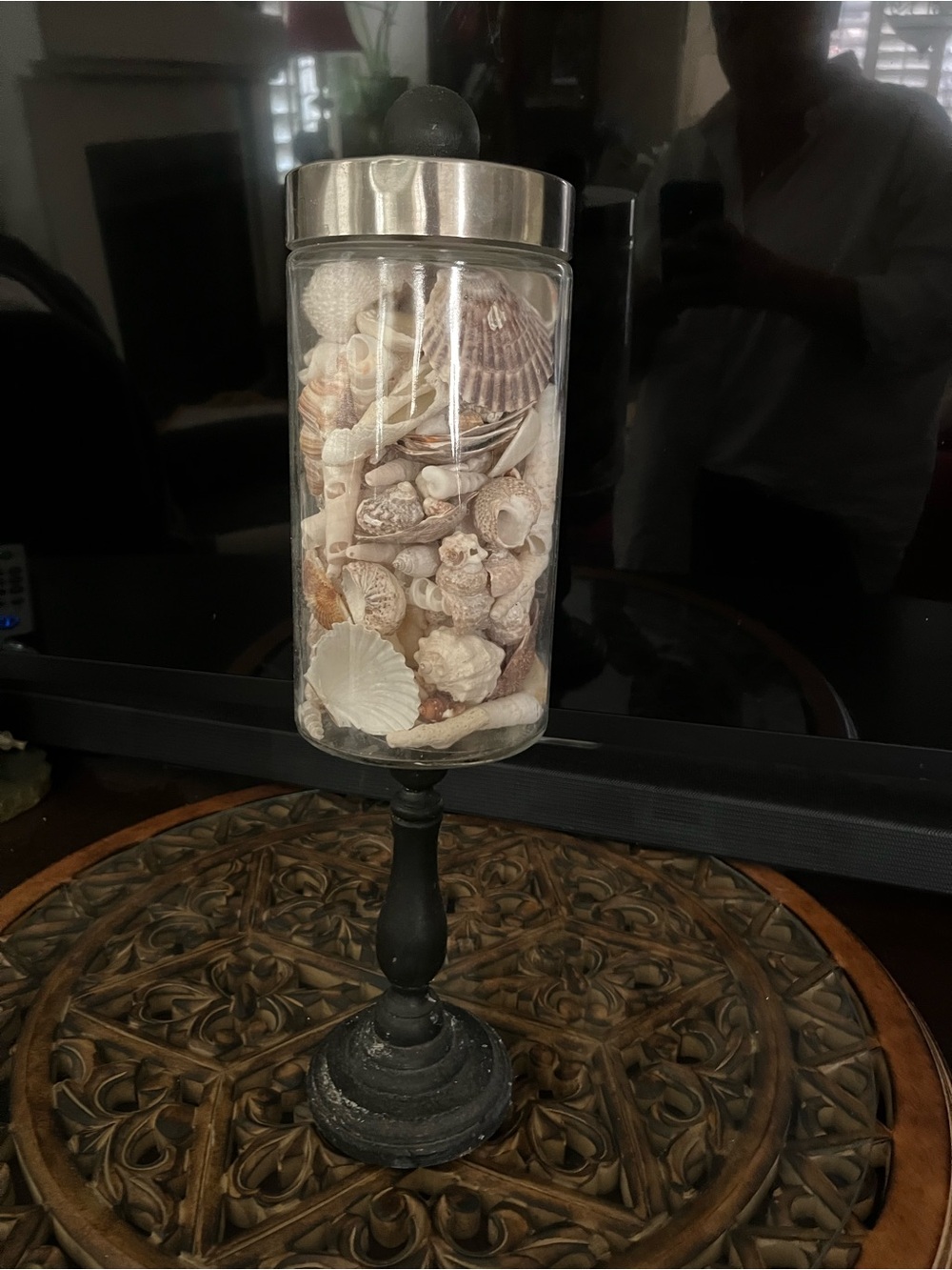 Decorative Glass Jar with Shells on Black Pedestal
